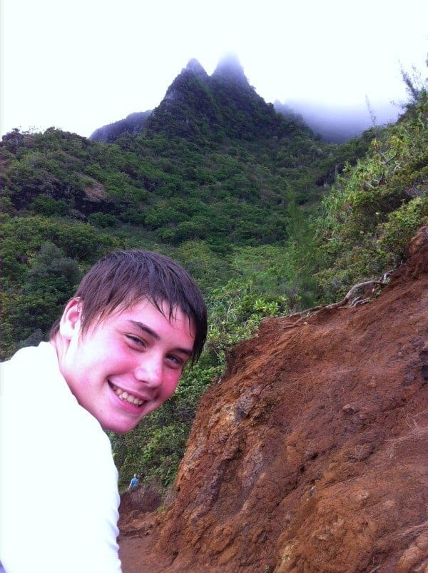 boy hiking on na pali coast