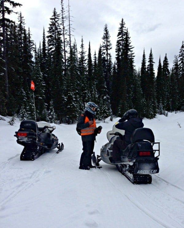 Embrace the spirit of winter adventure by snowmobiling at Sun Peaks Resort in the champagne powder of Canada's second largest ski resort. | thetravellingmom.ca