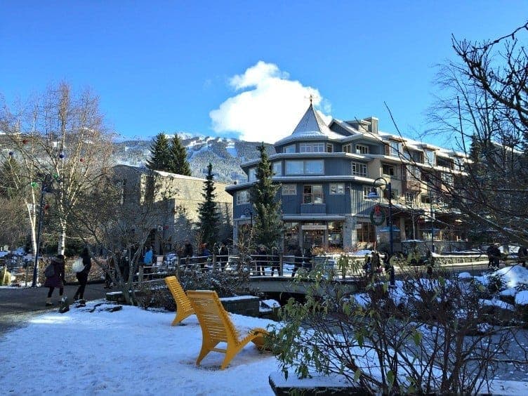 whistler main village with snow in winter