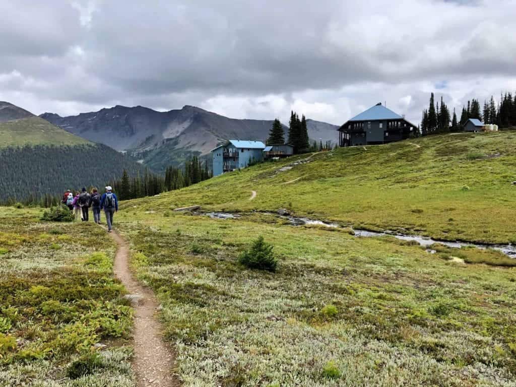 hikers going to purcell mountain lodge