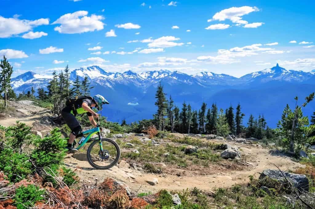 man mountain biking on whistler mountain