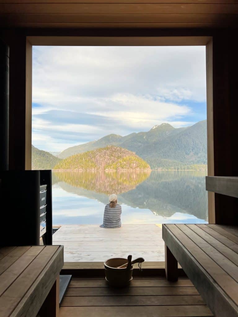 lady enjoying floating sauna in tofino